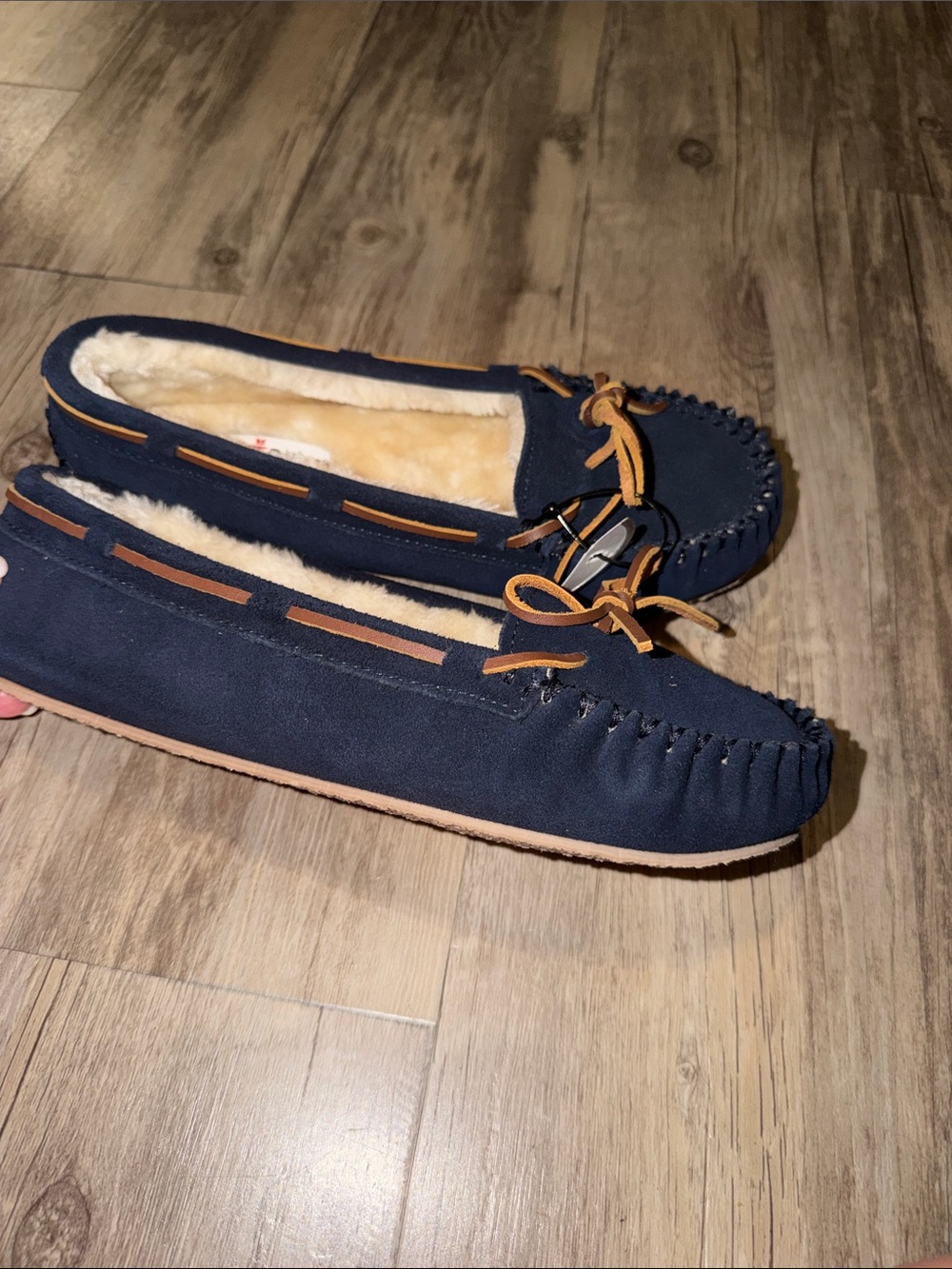 Minnetonka Navy Suede Moccasins with Tan Trim
